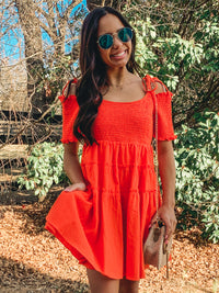 Orange smocked detail tiered mini dress