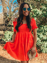 Orange smocked detail tiered mini dress
