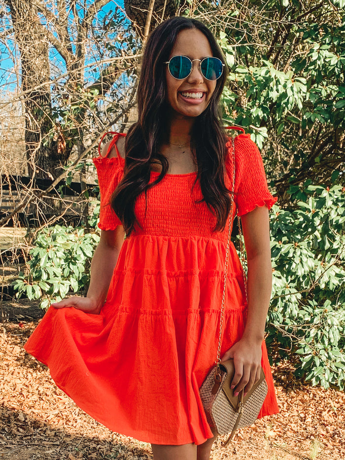 Orange smocked detail tiered mini dress