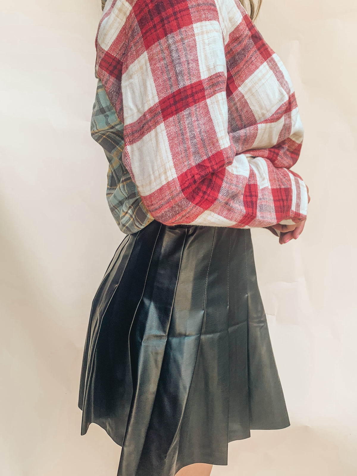 BLACK HIGH RISE LEATHER PLEATED MINI SKIRT