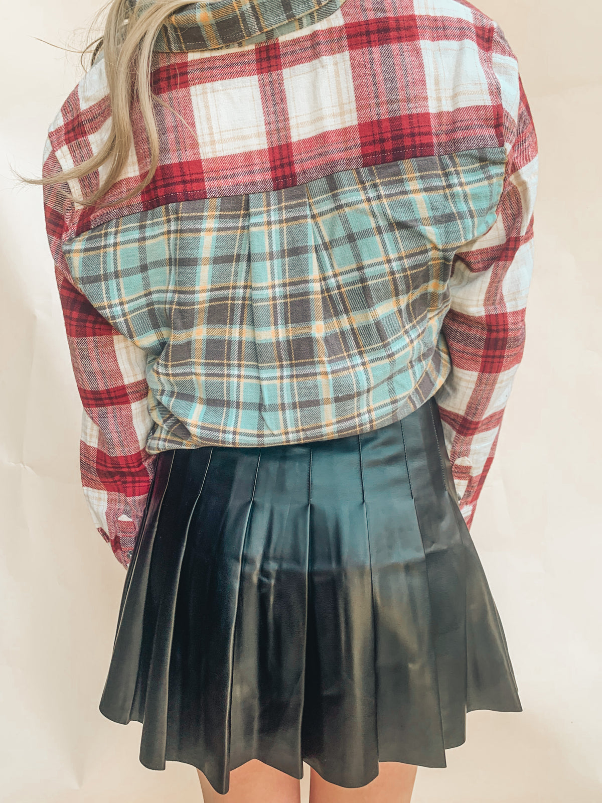 BLACK HIGH RISE LEATHER PLEATED MINI SKIRT