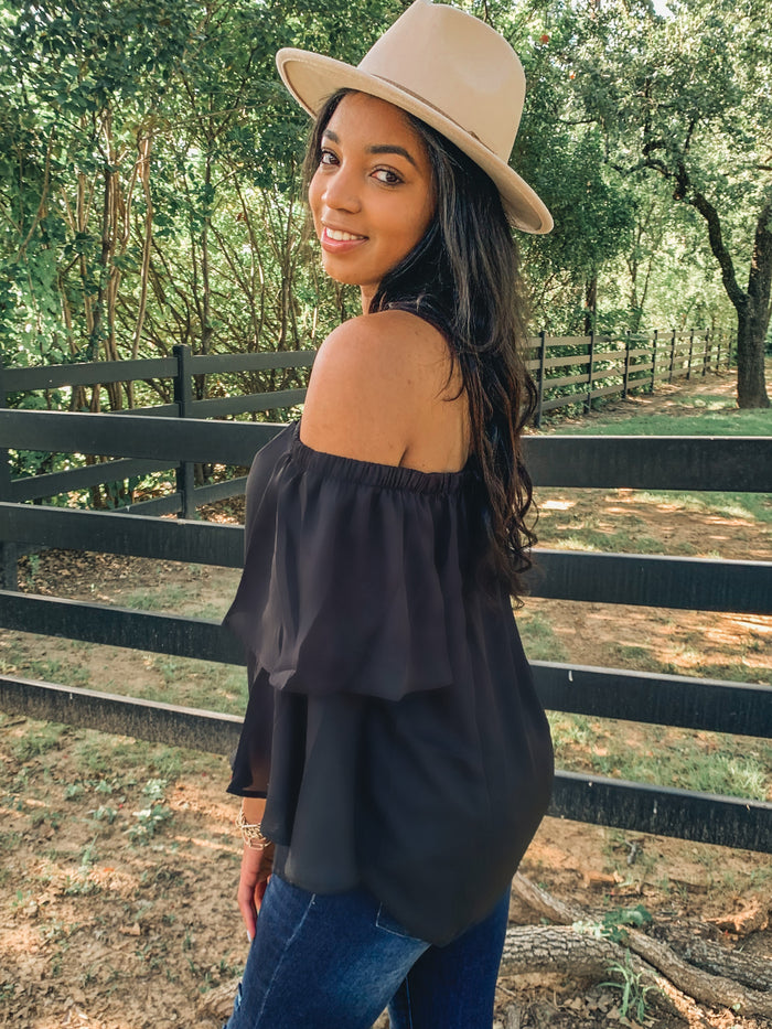 Black off shoulder ruffle blouse