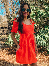 Orange smocked detail tiered mini dress