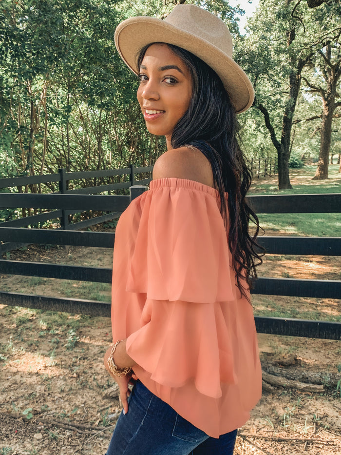 Orange off shoulder ruffle blouse