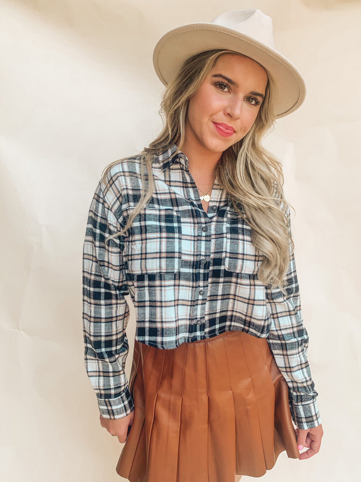 BROWN HIGH RISE LEATHER PLEATED MINI SKIRT