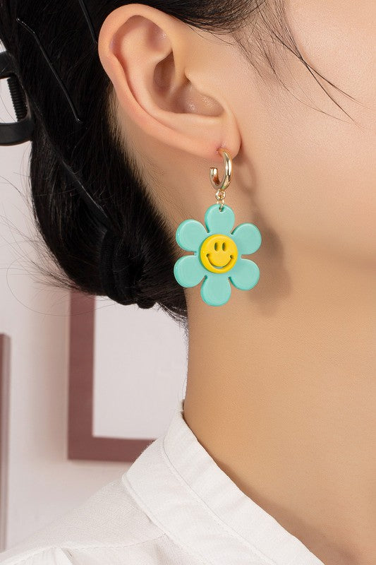 Huggie hoop dangling flower smiley face earrings