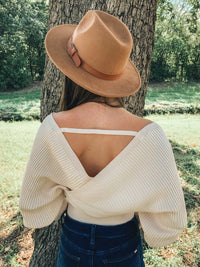 It’s back! Best seller! Ivory Tie Front Long Sleeve Wrap Sweater
