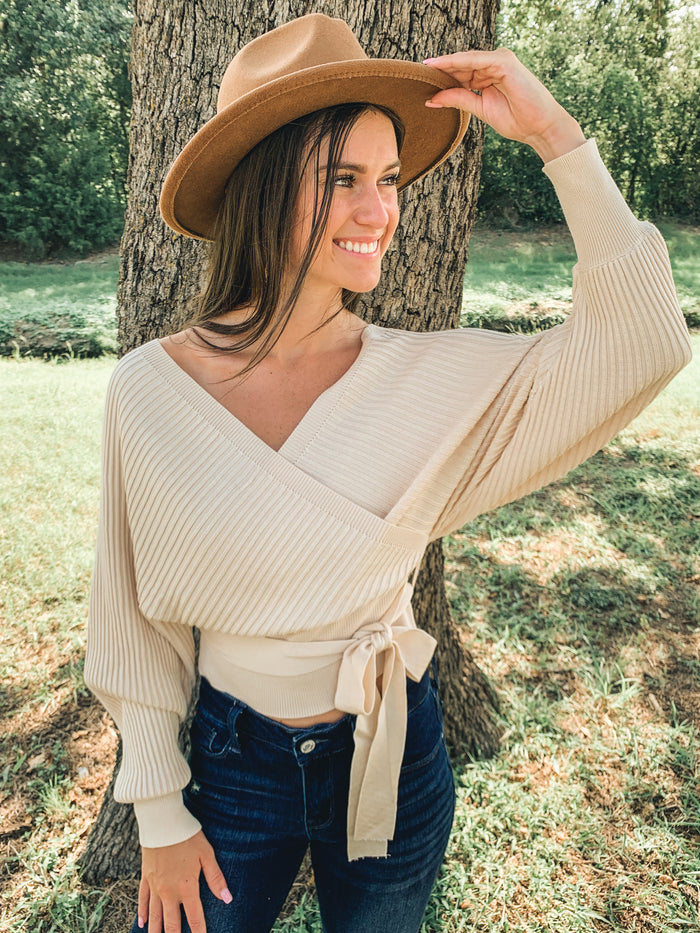 It’s back! Best seller! Ivory Tie Front Long Sleeve Wrap Sweater